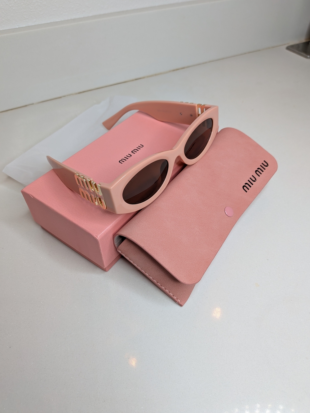 Miu Miu Pink Cat-Eye Sunglasses with Gold Logo Accent - Picture 7 of 12